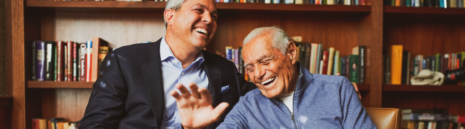 Two residents smiling and laughing