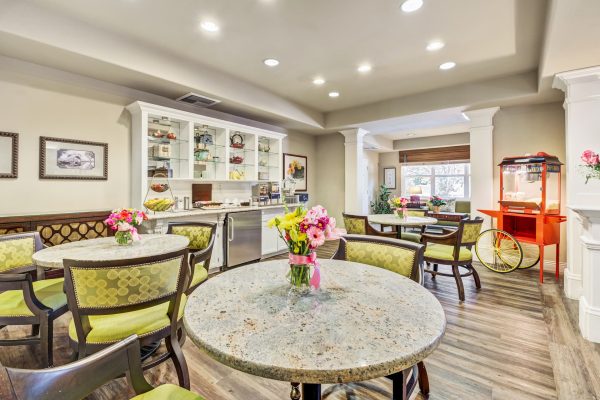 A large seating area with tables and chairs.