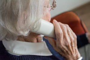 hearing loss senior with phone