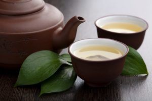 a tea set filled with tea